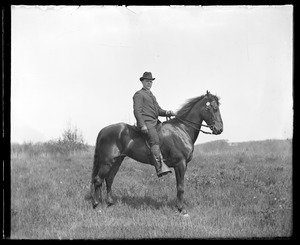 Unidentified man on horse