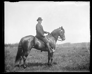 Unidentified man on horse