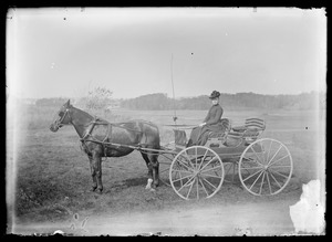 Stella Good in horse-drawn carriage