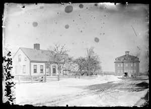 Unidentified property at intersection East and Leavitt Sts., Agricultural Hall in background