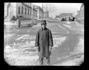 Man standing on North St., St. Paul's Church on the left