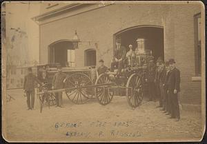 Fire steam pumper and wagon in front of Foster Street fire house