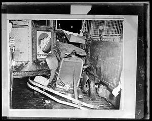 Auto jammed between st. car 1934