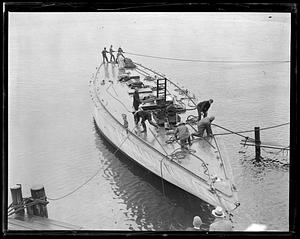 Yacht in water, not fully constructed