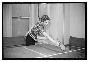 A woman playing table tennis