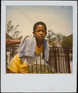 Boy posing in Newtowne Court