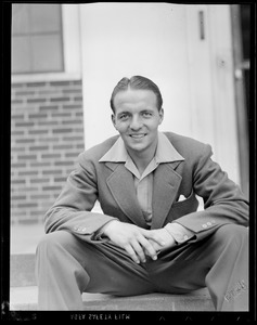 Unidentified player in street clothes