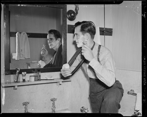 Player shaving in clubhouse
