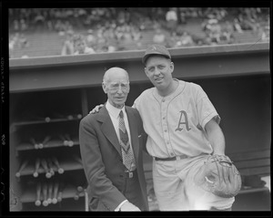 Philadelphia Athletics player with Connie Mack