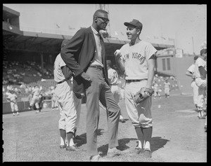 Bill Russell talking with Yankee player at Fenway Park
