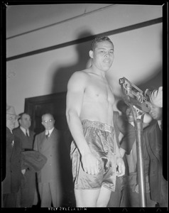 Joe Louis weighs in before McCoy fight, Boston Garden