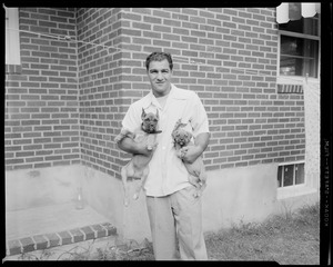 Rocky Marciano with two of his dogs