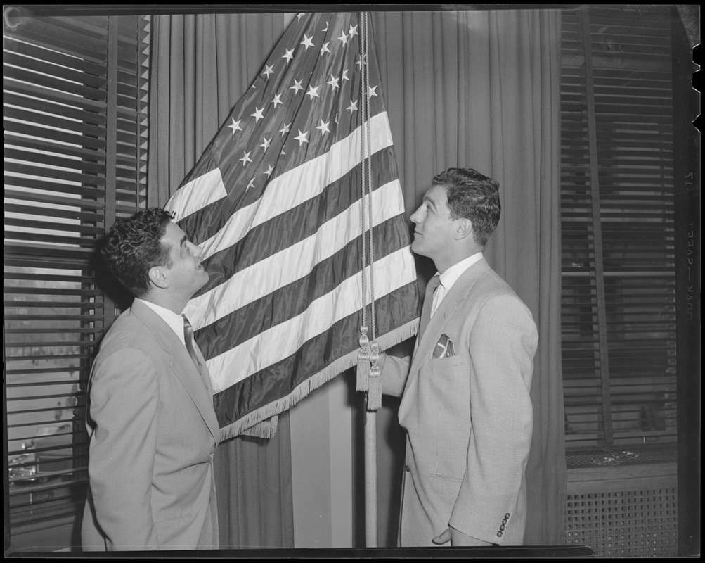 Rocky Marciano admires Old Glory, Brockton