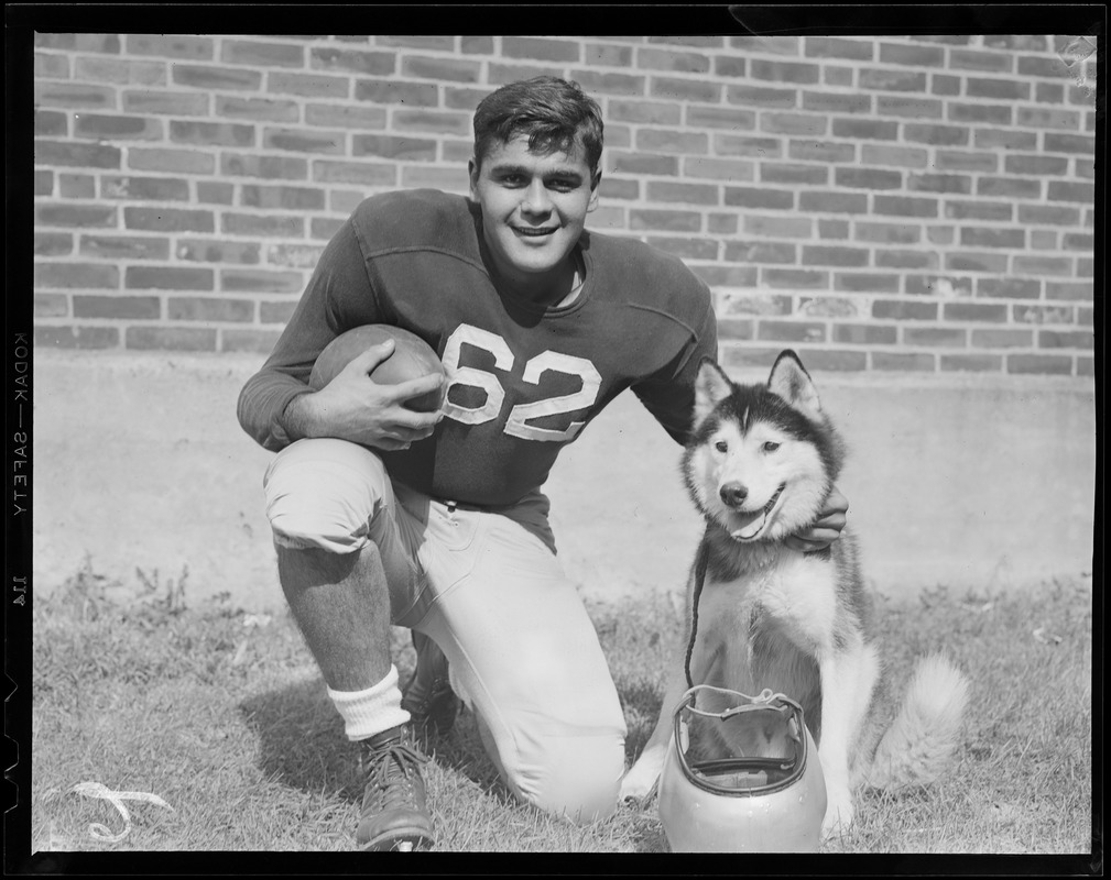 Northeastern player no. 62 with mascot