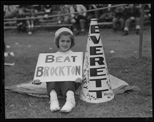 Everett High School fan with "Beat Brockton" sign