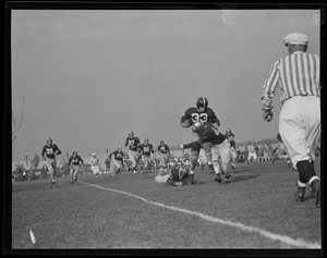 Harvard player tackled by Dartmouth during J.V. game at Soldiers Field