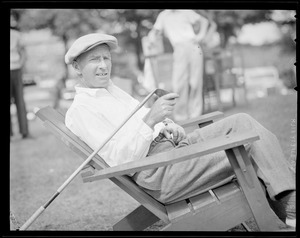 Golfer reclines for a moment