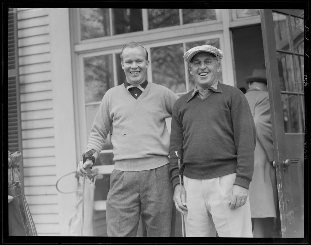 Two men outside clubhouse