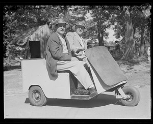Marshalls riding in golf cart
