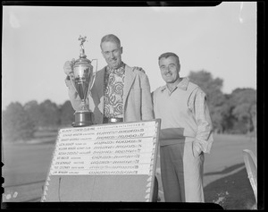 Edward Martin holds trophy after winning tournament at Belmont Country Club