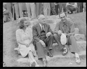 Golfer Ted Bishop with manager of the Hotel Avery and daughter