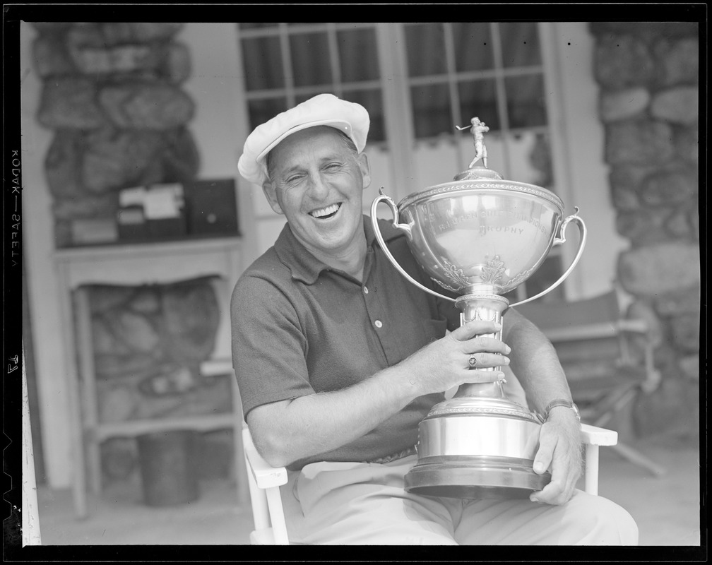 Man holds Rhode Island Open trophy