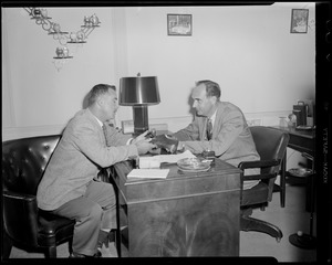 Two men in office in clubhouse