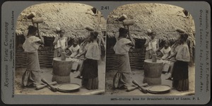 Hulling rice for breakfast, Island of Luzon, P.I.