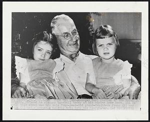Home From the Wars- Manager Burt Shotton of the Brooklyn Dodgers, refused to discuss baseball today at his winter home here. All he would talk about was his twin four-year-old grand-daughters Joann (R) and Jane (L) and a proposed hunting trip into the Everglades.