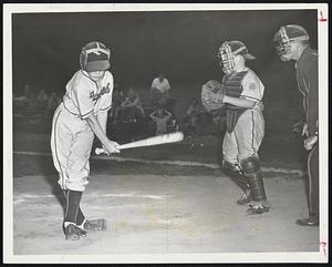Crossed Ankles by Kevin Smith of the Braves. Catcher Fran McGourty of the Indians has the ball.