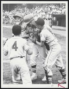 Hero’s Welcome is given Newton North shortstop Pete DiDomenico after belting two-run homer that gave Newton 4-3 win over Stoughton for state Little League championship at Braintree yesterday.