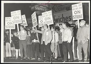Lynn GE Workers march from Union headquarters on Western avenue to picket company’s main gate.
