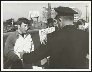 Boston Army Base Draft Protest Capt. James Emord, Gov. Security Police keeps protester back in line.