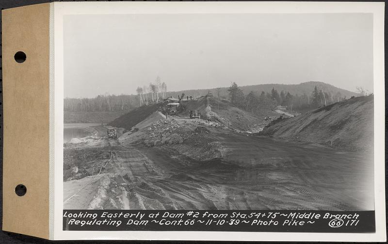 Contract No. 66, Regulating Dams, Middle Branch (New Salem), and East Branch of the Swift River, Hardwick and Petersham (formerly Dana), looking easterly at dam 2 from Sta. 54+75, middle branch regulating dam, Hardwick, Mass., Nov. 10, 1939