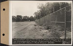 Contract No. 80, High Level Distribution Reservoir, Weston, looking east along Florence E. McNutt property line showing uncompleted fence, high level distribution reservoir, Weston, Mass., Aug. 12, 1940