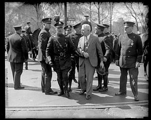 Unidentified man surrounded by police