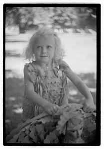 Girl holding decorated hoop