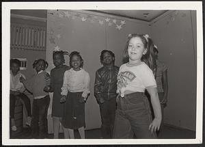 Group of girls dancing and singing