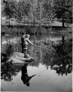 Fishing in Mill Pond, Waverly Oaks.