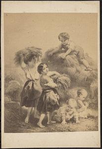 Five children playing in hay