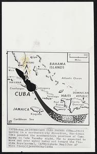 Hurricane Cleo Pounds Cuba--Still moving in a northwesterly direction, Hurricane Clea pounded the southwestern province of Camaguey in Cuba Tuesday night. She is expected to move out over water today and toward the Florida Keys(arrow).