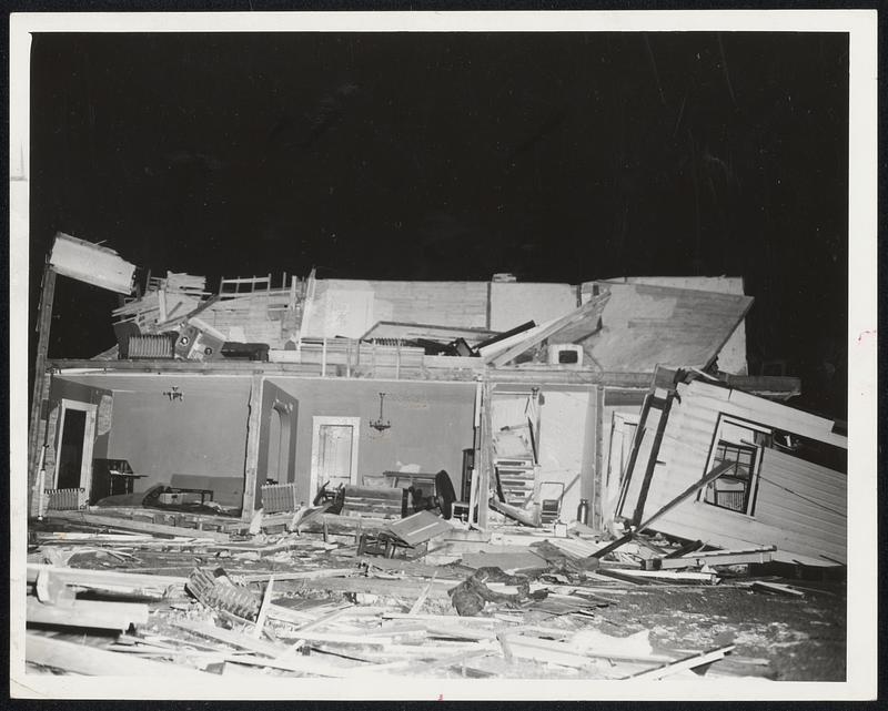 Shambles in Shrewsbury-The tornado that struck central Massachusetts communities yesterday turned this home into a shambles. Roof and sides were torn apart and blown away with radiators and furniture.