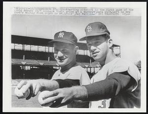 Busch Stadium- Starting pitchers in the first game of the World Series 10/7 compare their grips at a workout here 10/6. Left is New York's Whitey Ford, right is St. Louis', Ray Sadecki.