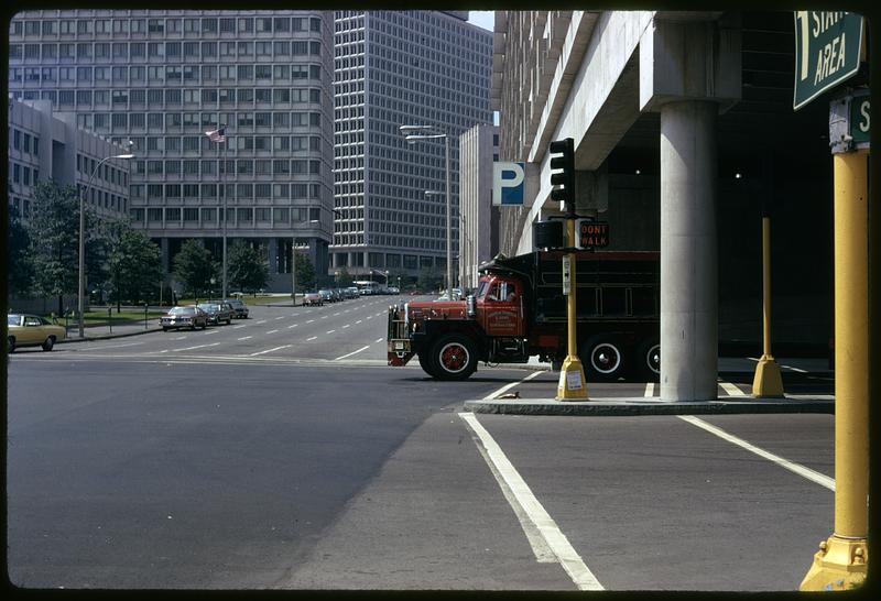 Truck coming out of a parking structure