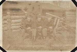 Five U.S. Marines in log cabin, Marine base Quantico, VA