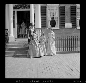 Three women and man on stairs, Chestnut Street Day