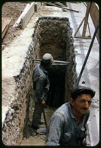 Men excavating hole, Athens, Greece