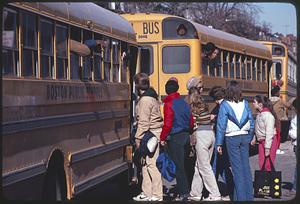 Students boarding Boston Public School buses