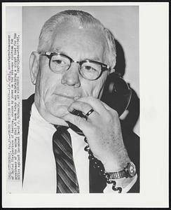 Checks Election Results--I.W. Abel, secretary-treasurer of United Steelworkers of America, checks by phone on the see-saw election for presidency of the union. Abel at noon today was maintaining a slight lead for the office against incumbent David J. McDonald.