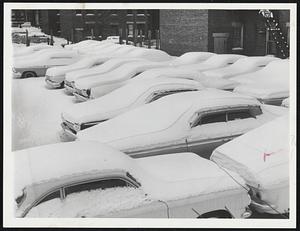 Snow covered cars on Kilmarnock St. Back Bay.